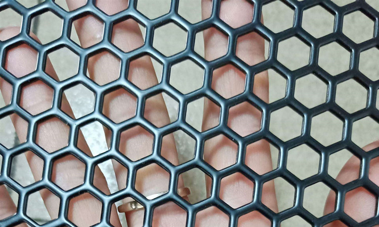 Display of hexagonal punching net products