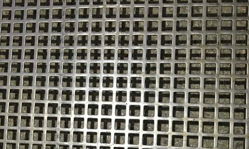 Metal plate with holes