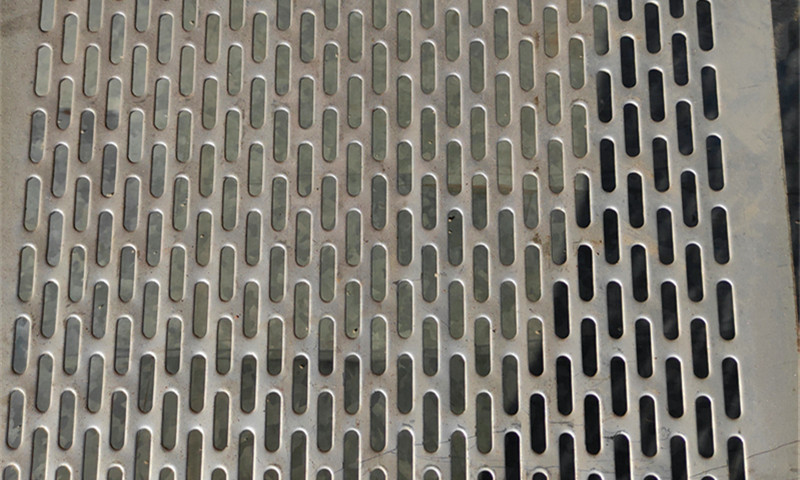 Metal plate with holes