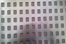 How are burrs formed on the backside of stainless steel perforated sheet?