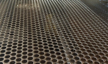 What is the relationship between the aperture of stainless steel perforated sheet and the hole distan