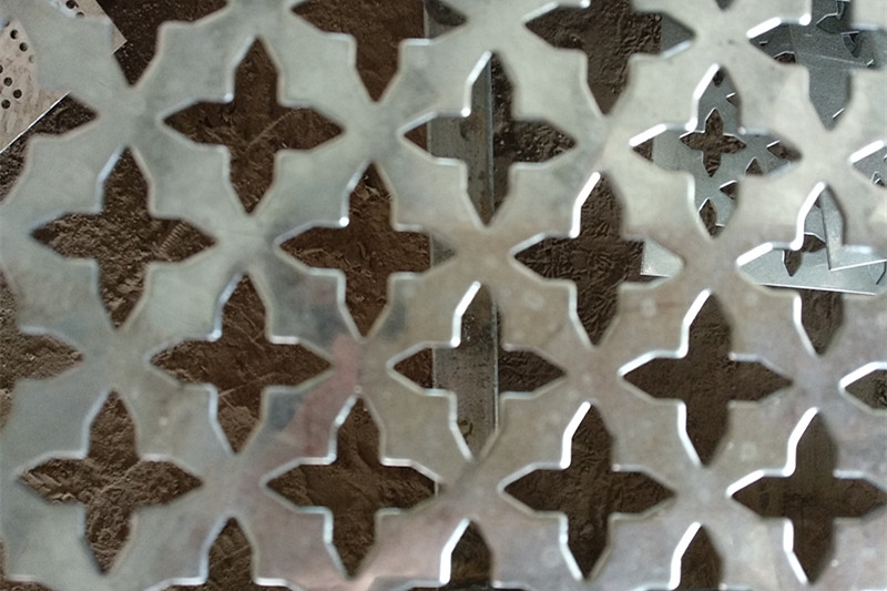 Cross hole perforated sheet